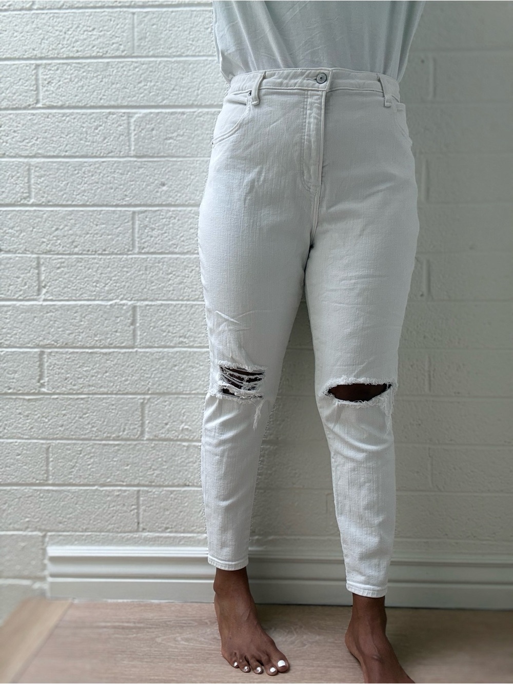 Abercrombie & Fitch The Super Skinny High Rise White Distressed Ankle Jeans